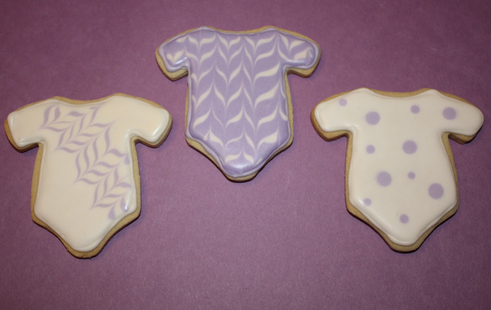 Mel's Sweet Treats: Baby Cookies for a Purple and White Baby Shower
