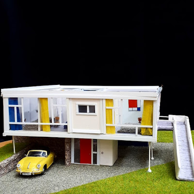 1/48-scale mid-century modern house in white with accents of bright colour.