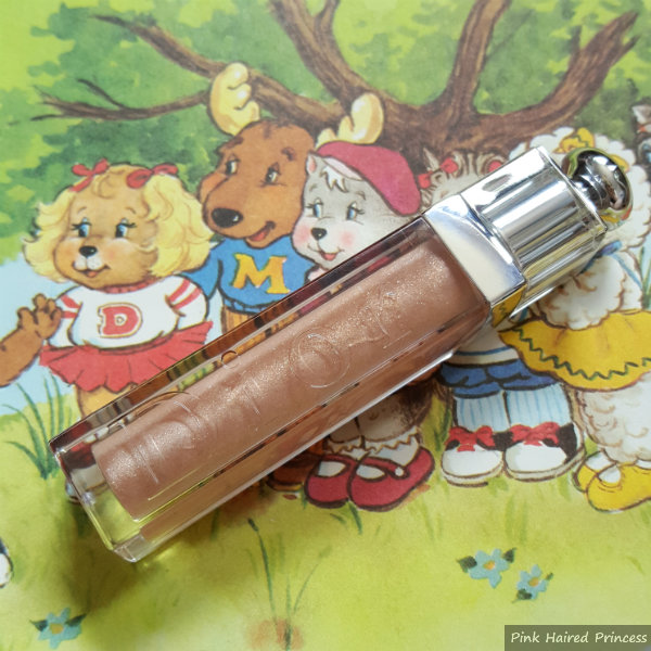 Dior Gloss Addict 311 Magic review dior lipgloss in nude colour on get along gang vintage image background