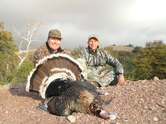 Tres and Darr Colburn with a nice beautiful Gould's turkey