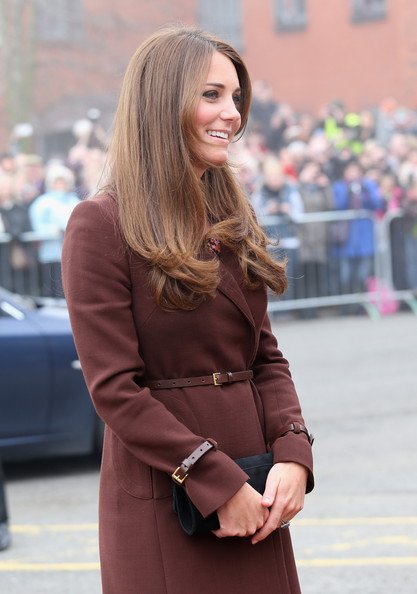 Kate Middleton wrapped up her baby bump in a brown Hobbs coat today when she arrived at the National Fishing Heritage Center