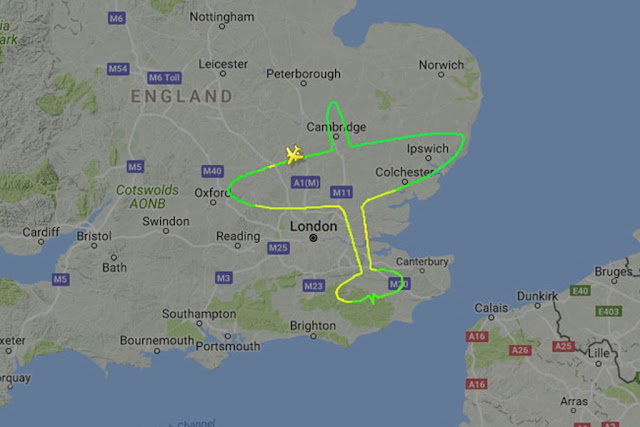 Pilot creates Spitfire shape over England