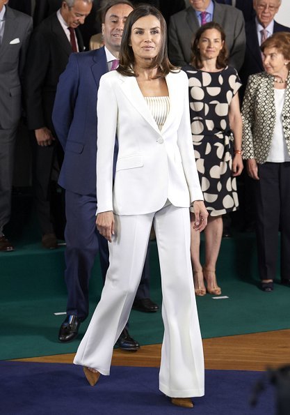Queen Letizia looked radiant in white, debuting a crisp wide leg pantsuit by Carolina Herrera