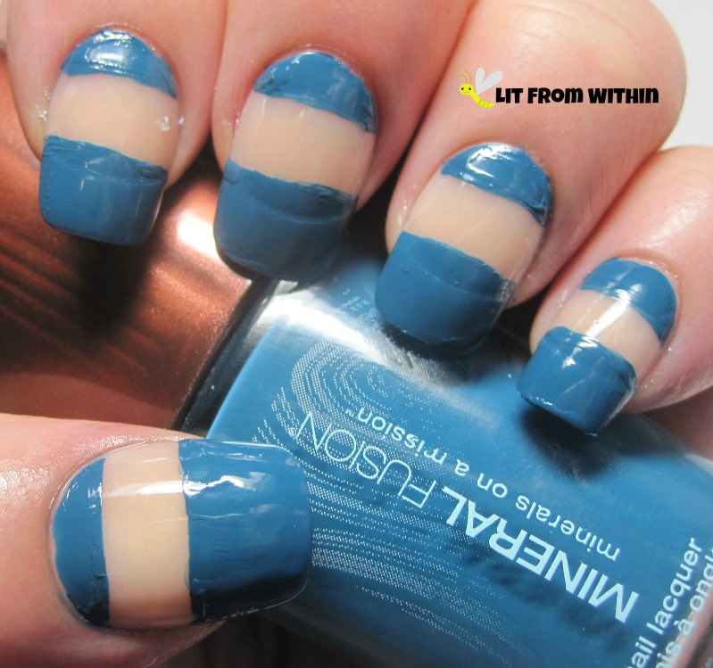 I used Mineral Fusion Sapphire Dream and a piece of tape to paint a small section at the top of my nails, and a large section below.