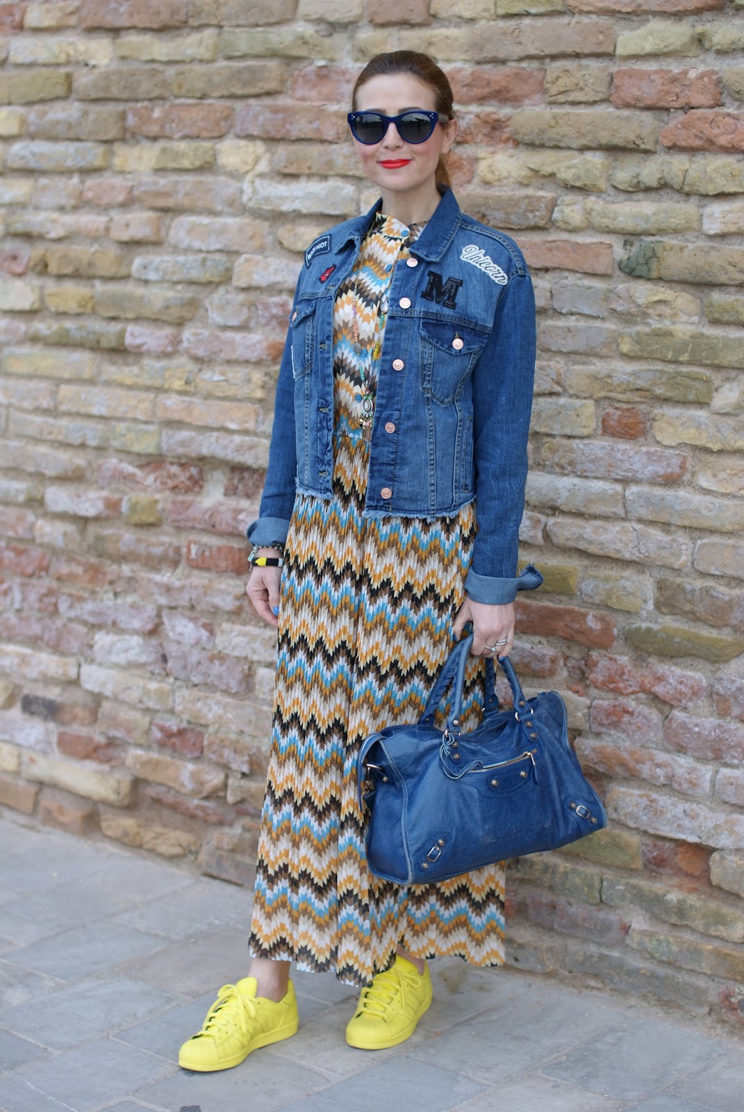 Pleated maxi dress and denim patched jacket on Fashion and Cookies fashion blog, fashion blogger style