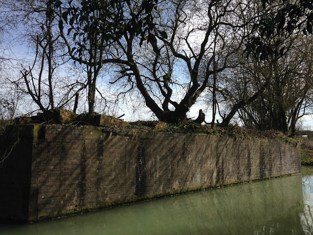 Remains of a bridge carrying the Midland and South Western Junction Railway over the Kennet and Avon Canal