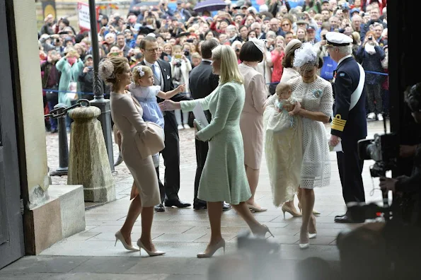 Queen Silvia and King Carl Gustaf of Sweden, Crown Princess Victoria, Prince Daniel, Princess Estelle, Princess Madeleine of Sweden with daughter Princess Leonore and Christopher O'Neill, Prince Carl Philip and Princess Sofia, Prince Haakon and Princess Mette-Marit of Norway, Crown princess Mary and Prince Frederik of Denmark, Ewa and Olle Westling at the christening of Prince Oscar of Sweden at the Royal Chapel in Stockholm.Antonio Berardi Blue Cape-back Stretch Crepe Dress