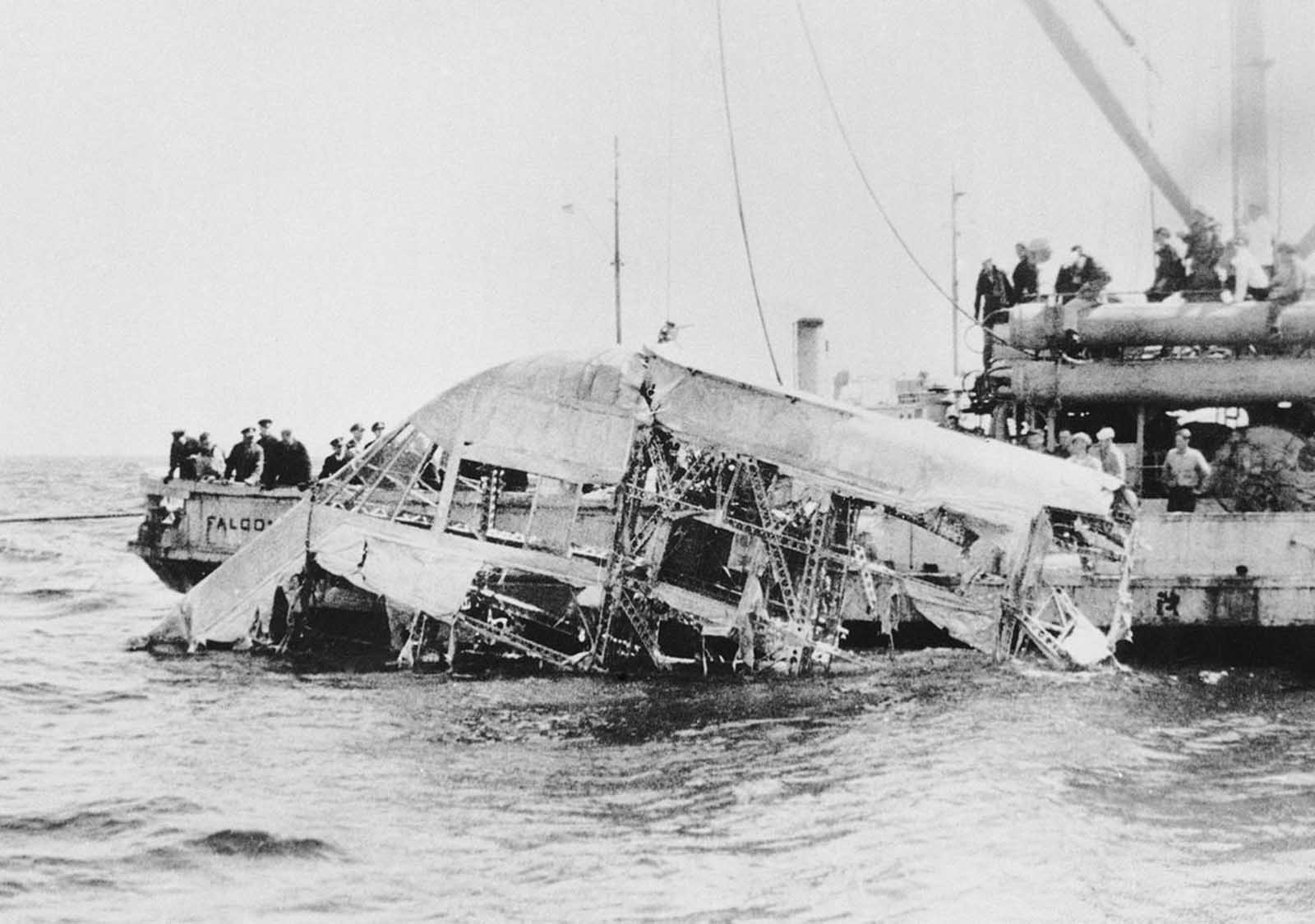 The wreckage of the naval dirigible USS Akron is brought to the surface of the ocean off the coast of New Jersey, on April 23, 1933. The Akron went down in a violent storm off the New Jersey coast. The disaster claimed 73 lives, more than twice as many as the crash of the Hindenburg. The USS Akron, a 785-foot dirigible, was in its third year of flight when a violent storm sent it crashing tail-first into the Atlantic Ocean shortly after midnight on April 4, 1933.