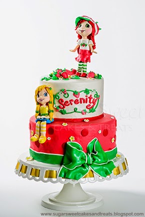 Front view of the Strawberry Shortcake Cake with Strawberry Shortcake and Lemon Meringue Gumpaste Cake Toppers.