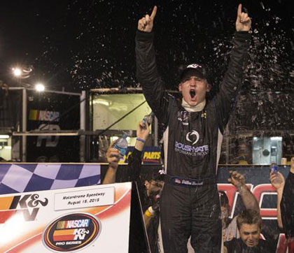  Dillon Bassett and team celebrate in Victory Lane following his first career NASCAR K&N Pro Series East win Saturday night at Motordrome Speedway. Mitchell Leff/Getty Images for NASCAR 