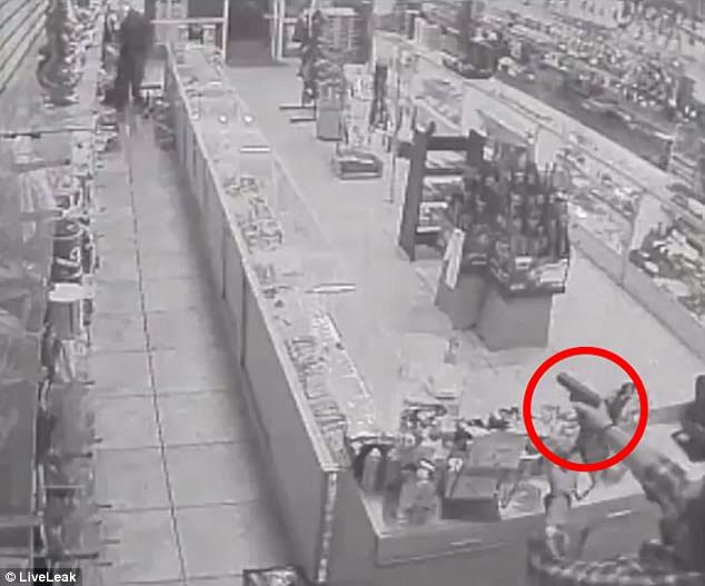Surveillance video shows the shocking moment Las Vegas store clerk shot