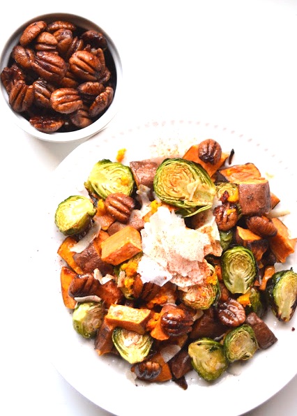 Orange Glazed Brussels Sprouts and Sweet Potatoes are a perfect mix of sweet and savory that would be a great healthier side dish for any holiday party! www.nutritionistreviews.com