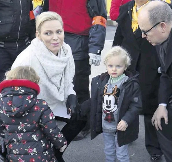 Prince Albert, Princess Charlene, Princess Gabriella and Prince Jacques visited Teleton and Christmas Market