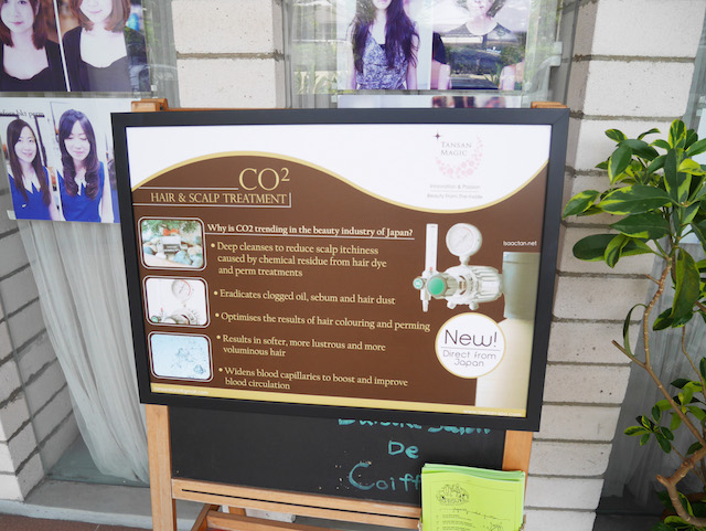 A notice promoting their CO2 Hair & Scalp treatment