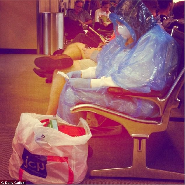 Is this woman over the top in her Ebola protective gear or sensible?