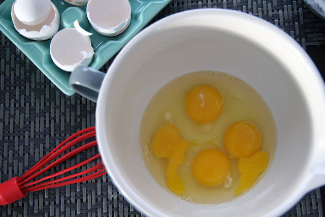 eggs cracked into a mixing bowl