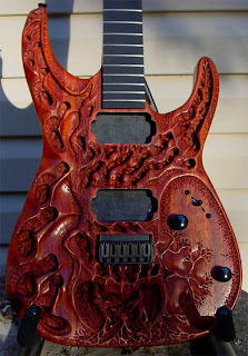 diseño de guitarras talladas a mano.