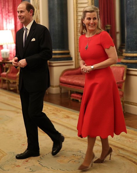 Kate Middleton wore a new red sequined tulle gown by Needle and Thread. The Countess of Wessex wore a stripe knit dress by Alaïa