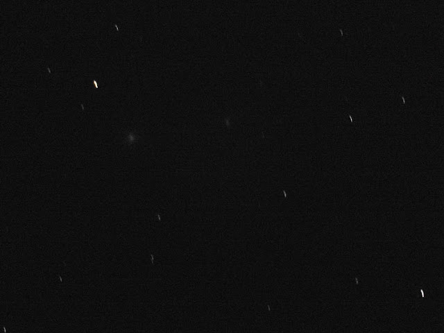 M87 shows up dimly, center left in this 30 second, 39 x 29 arcminute image (Source: Palmia Observatory)