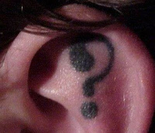 Symbol Tattoo design on ear