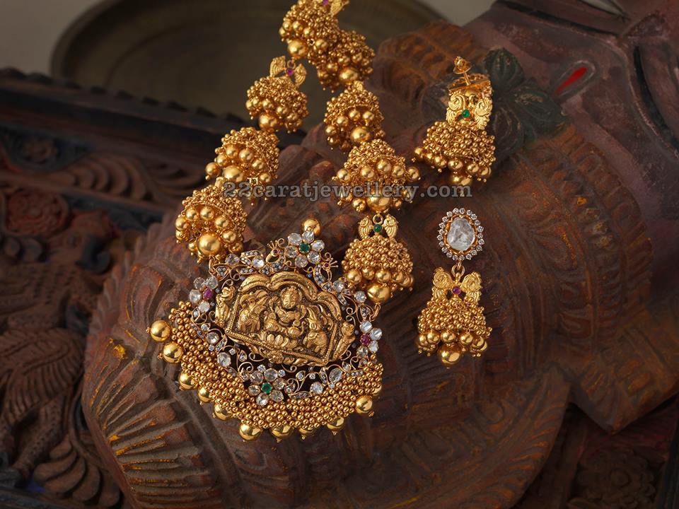 Emerald Lakshmi Set by Mangatrai Neeraj Jewellery Designs