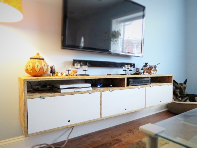 finished osb tv console floating on wall