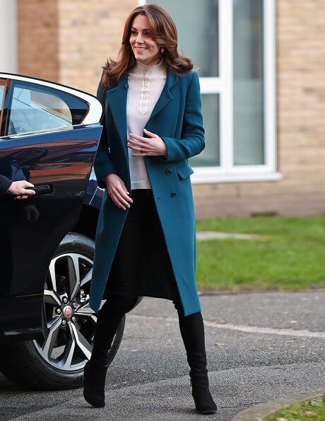 Kate Middleton wore Sezane Tulio jumper, Russell and Bromley FAB Dry ankle boots, Accessorize Filigree gold earrings, a blue wool coat