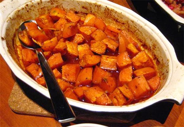 Spicy Honey-roasted Sweet Potatoes: Orange sweet potatoes in a spiced honey glaze.