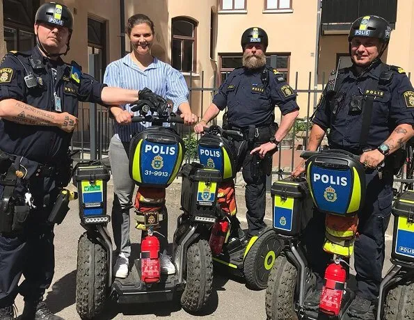 Crown Princess Victoria met police officers riding Segways in Södermalm