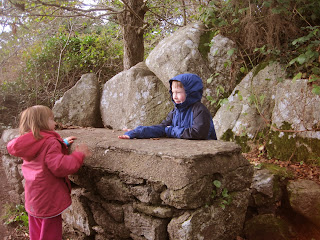 Children at a stone "table"