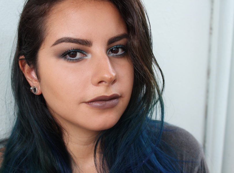 3. Blue Hair and Bold Winged Liner Makeup Look - wide 2