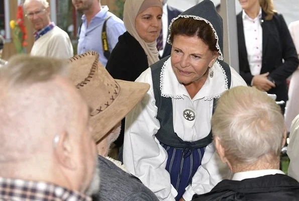 Swedish Queen Silvia visited Pensioners' Day 2018 event held at Ekebyhov Palace Park in Ekerö near Stockholm