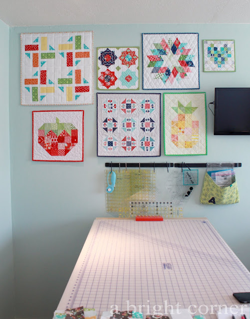 Wall of mini quilts