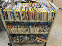 books to box cart of books