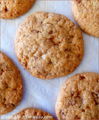 Giant Banana Toffee Cookies, mashed bananas and chocolate covered toffee add flavor to these cinnamon and sugar rolled cookies | Recipe developed by www.BakingInATornado.com | #recipe #cookies