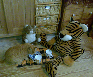 The Ginger Cat invites them to tea