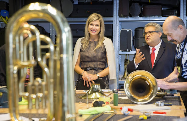 Queen Maxima of The Netherlands visit the Instrumentendepot Leerorkest and hand over the Amalia violin to Sanne Wiering in Amsterdam