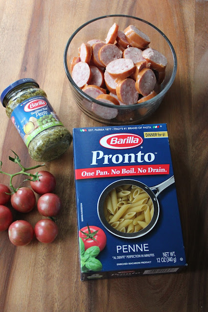 Get dinner on the table in minutes with this easy Pesto Penne with Polska Kielbasa one-pot meal!