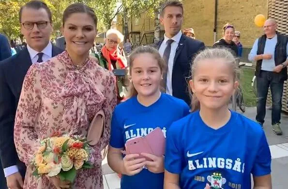 Crown Princess Victoria wore Ida Sjöstedt Peony blouse and Moody skirt, and Stinaa J. ankle suede boots