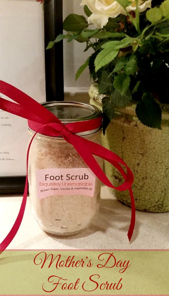 Sugar Foot Scrub in a mason jar with a red ribbon