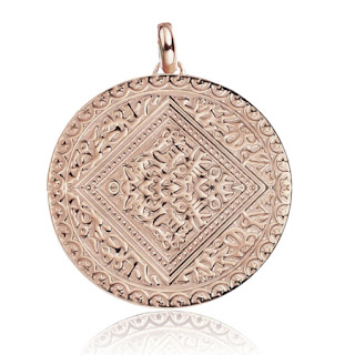 This mini Marie pendant is not strictly a coin but was inspired by an ancient coin that was given to Monica Vinader. It's quite popular as I used to see this often worn at my office. There aren't many rose gold coin pendants as naturally, they look more like the real thing in silver and gold, but I love the amount of detail on this pendant. - UK Jewellery Blog