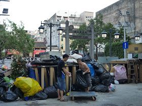 piles of trash at Largo do Pagode do Bazar