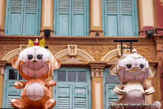 Chinese figures and typical window shutters, Singapore