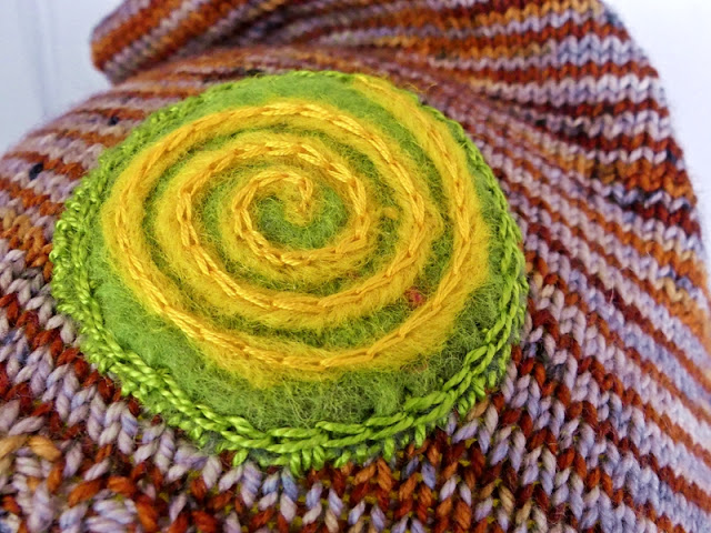 close-up of applique spiral for knit hat & gloves by Minaz Jantz