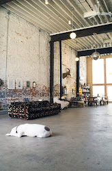 industrial bohemian concrete exposed garage warehouse brick furniture loft apartment decor wall bedroom converted lofts studio space interior living open