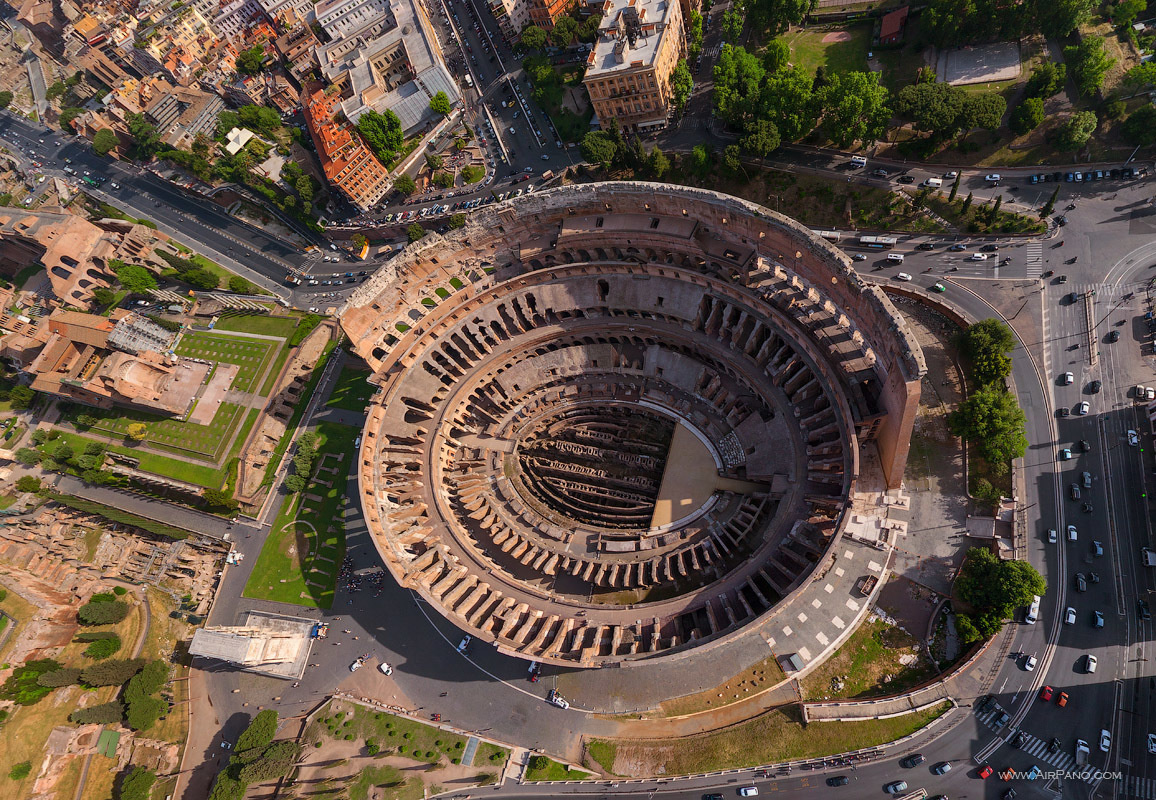 An amazing aerial look at the Roman Colosseum in Italy. - The Seven Wonders Of The World Look Totally Different In These Unique Photos.