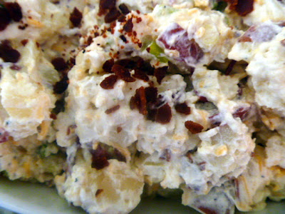 This taste like a loaded baked potato turned into a salad!  Loaded Baked Potato Salad is a MASTERPIECE! - Slice of Southern