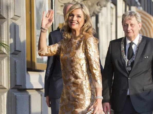 Queen Maxima and King Willem attends the Liberation Day Concert. Queen Maxima wore Jimmy Choo Tilly Metallic Pumps and Natan dress