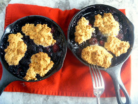 Try this Cast Iron Summer Berry Cobbler before the abundance of summer berries dissapear!  Perfect for Labor Day - Slice of Southern