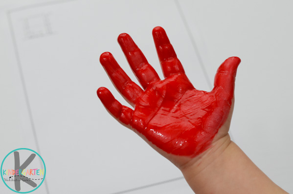paint childs hand red
